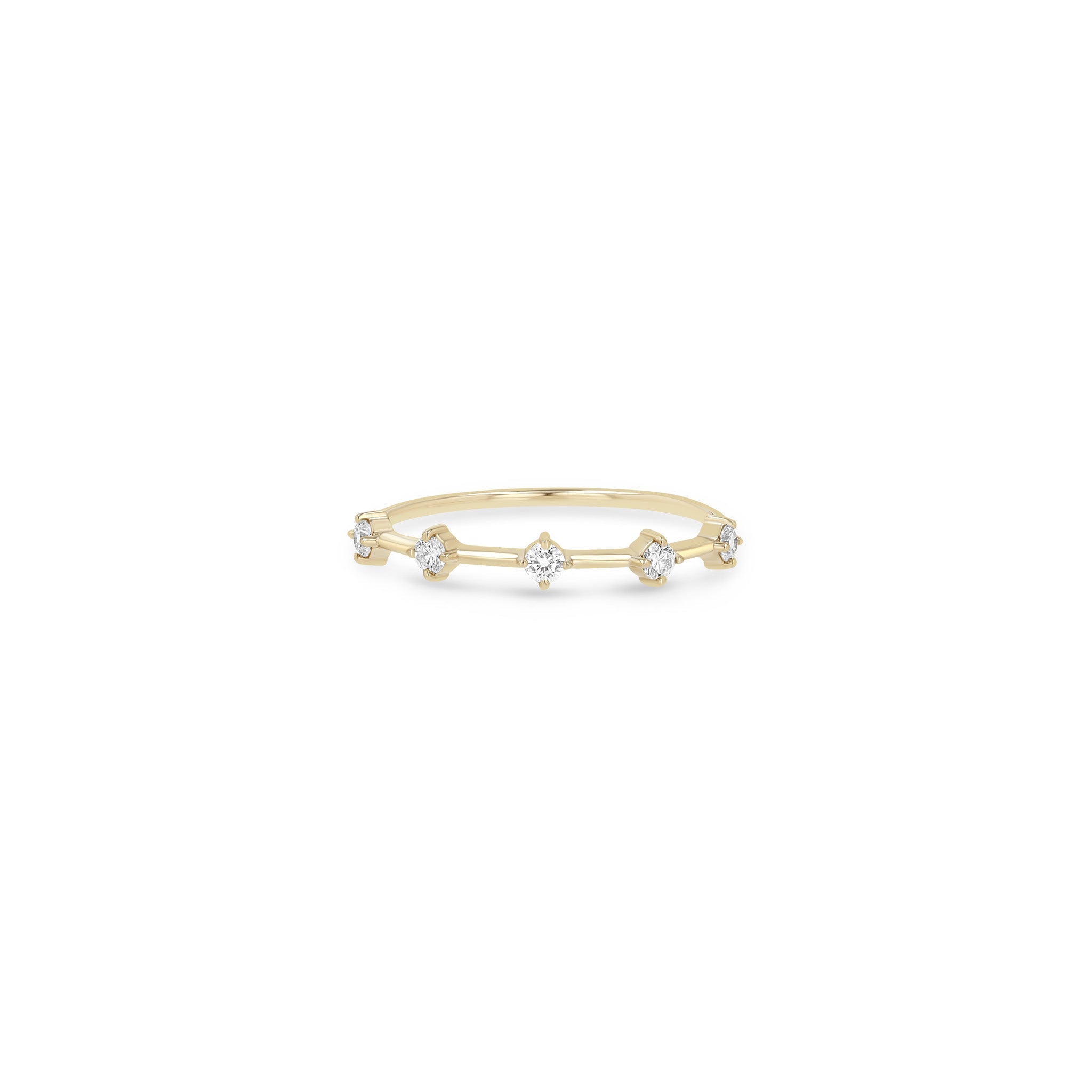 Zoe Chicco 14k gold thin ring with prong diamonds on a white background