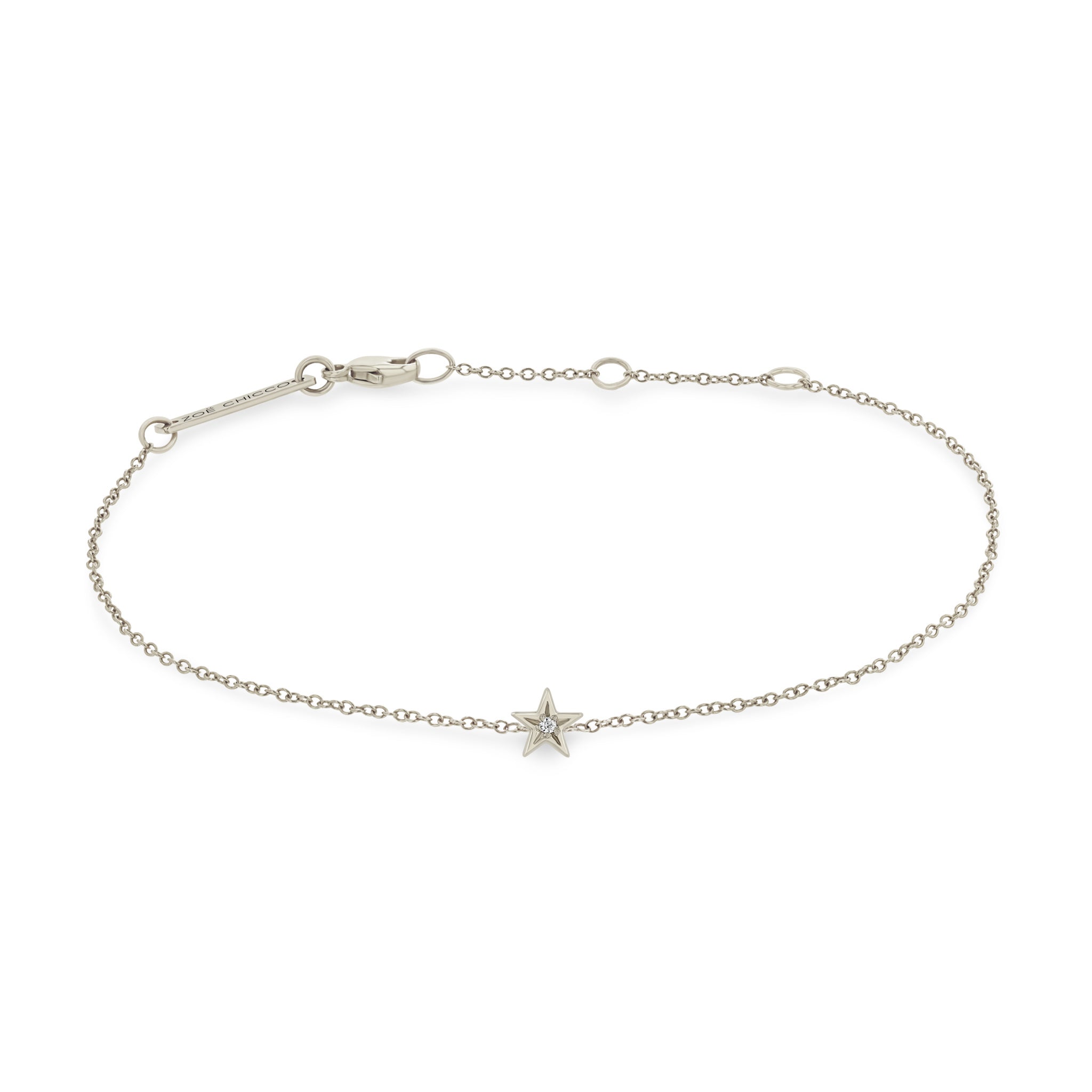 Zoe Chicco 14k white gold bracelet with an itty bitty star charm with a single white diamond in the center on a white background