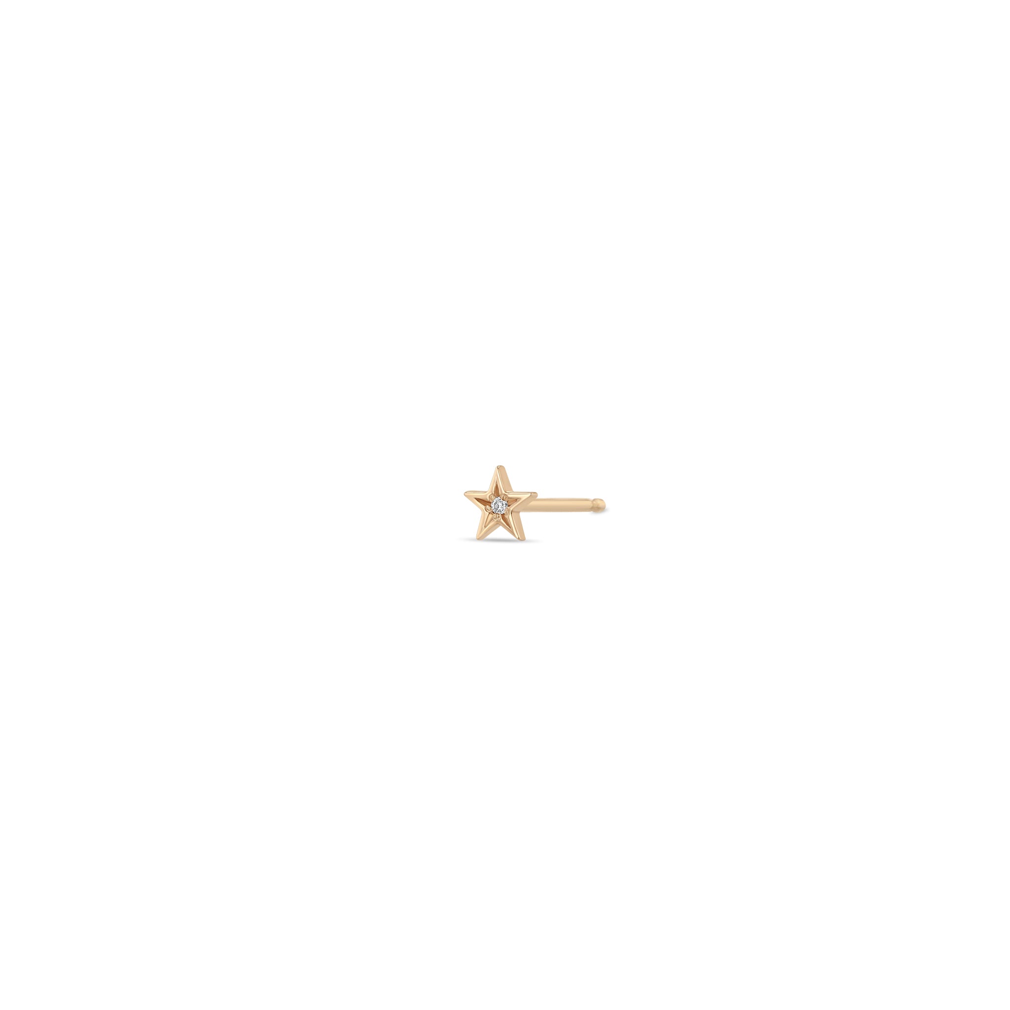 Zoe Chicco 14k rose gold itty bitty star stud with star set diamond in the center on a white background