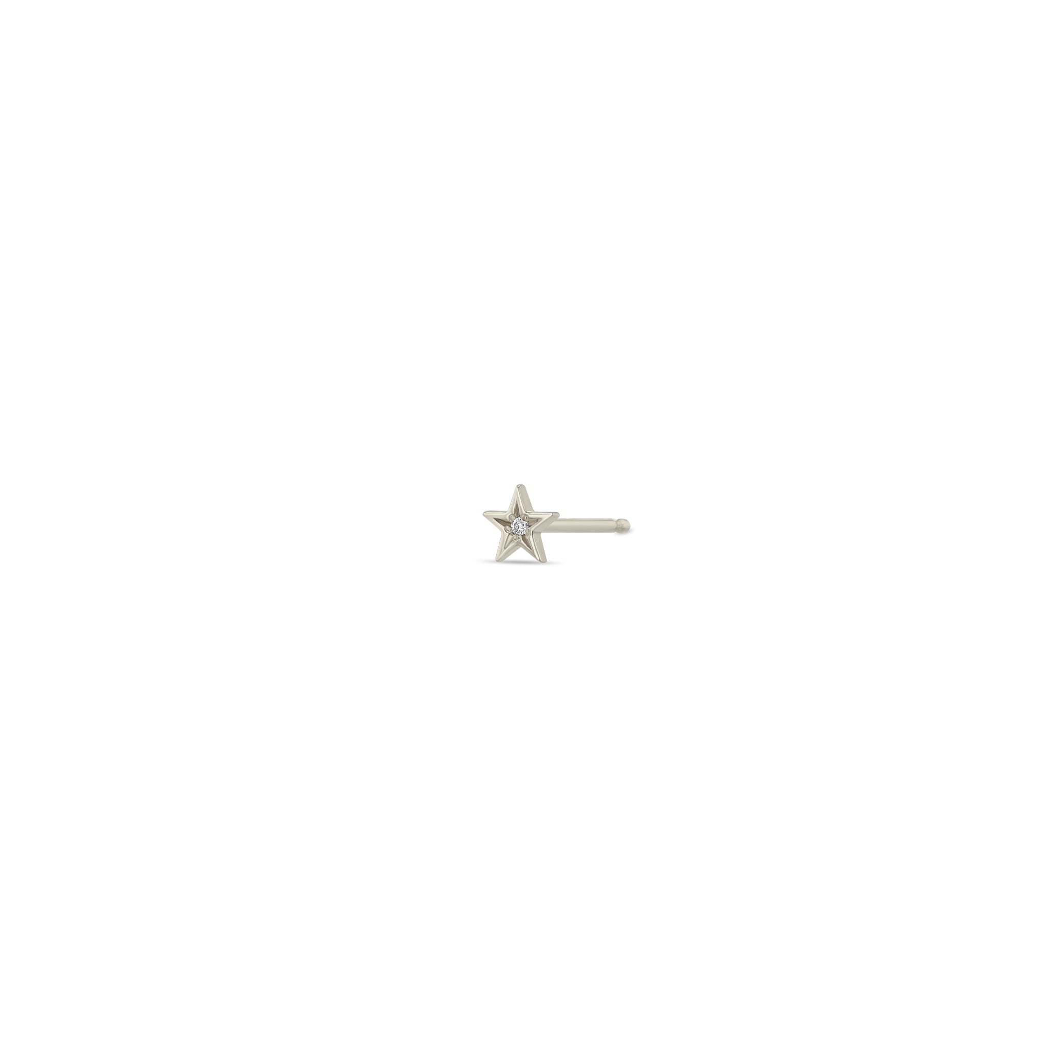 Zoe Chicco 14k white gold itty bitty star stud with star set diamond in the center on a white background