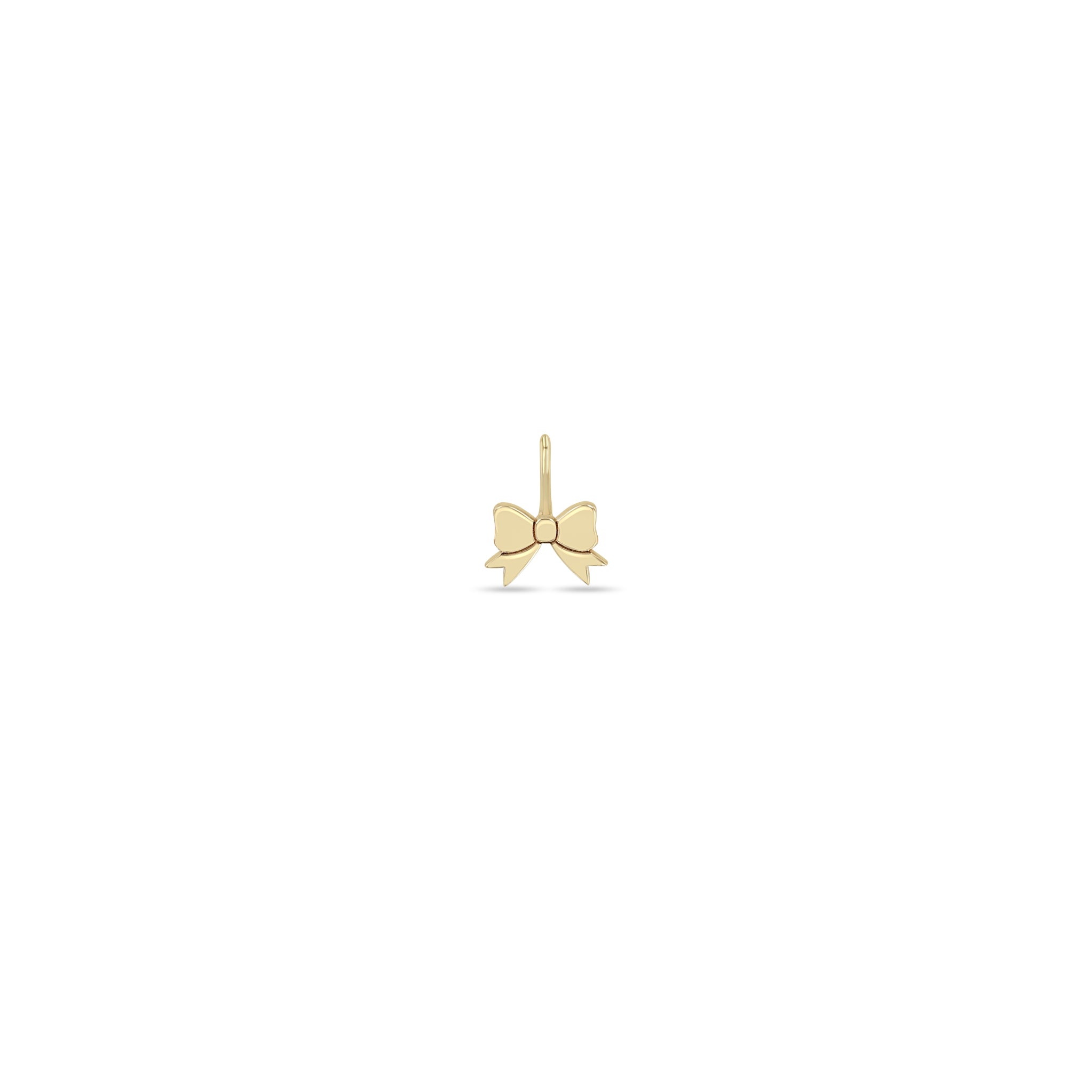 Zoe Chicco 14k gold midi bitty bow charm on a white background