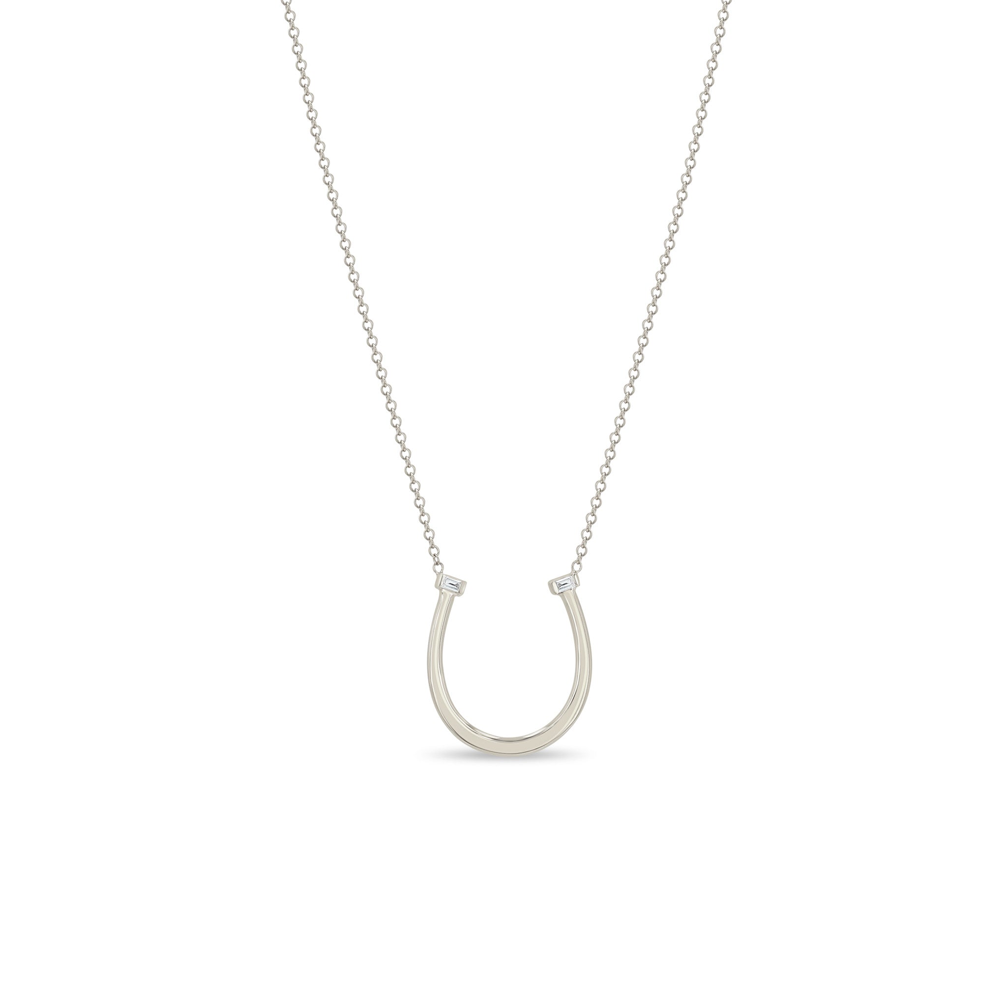 Zoe Chicco 14k white gold chain necklace with a thin horseshoe shaped pendant with two small baguette diamonds on a white background