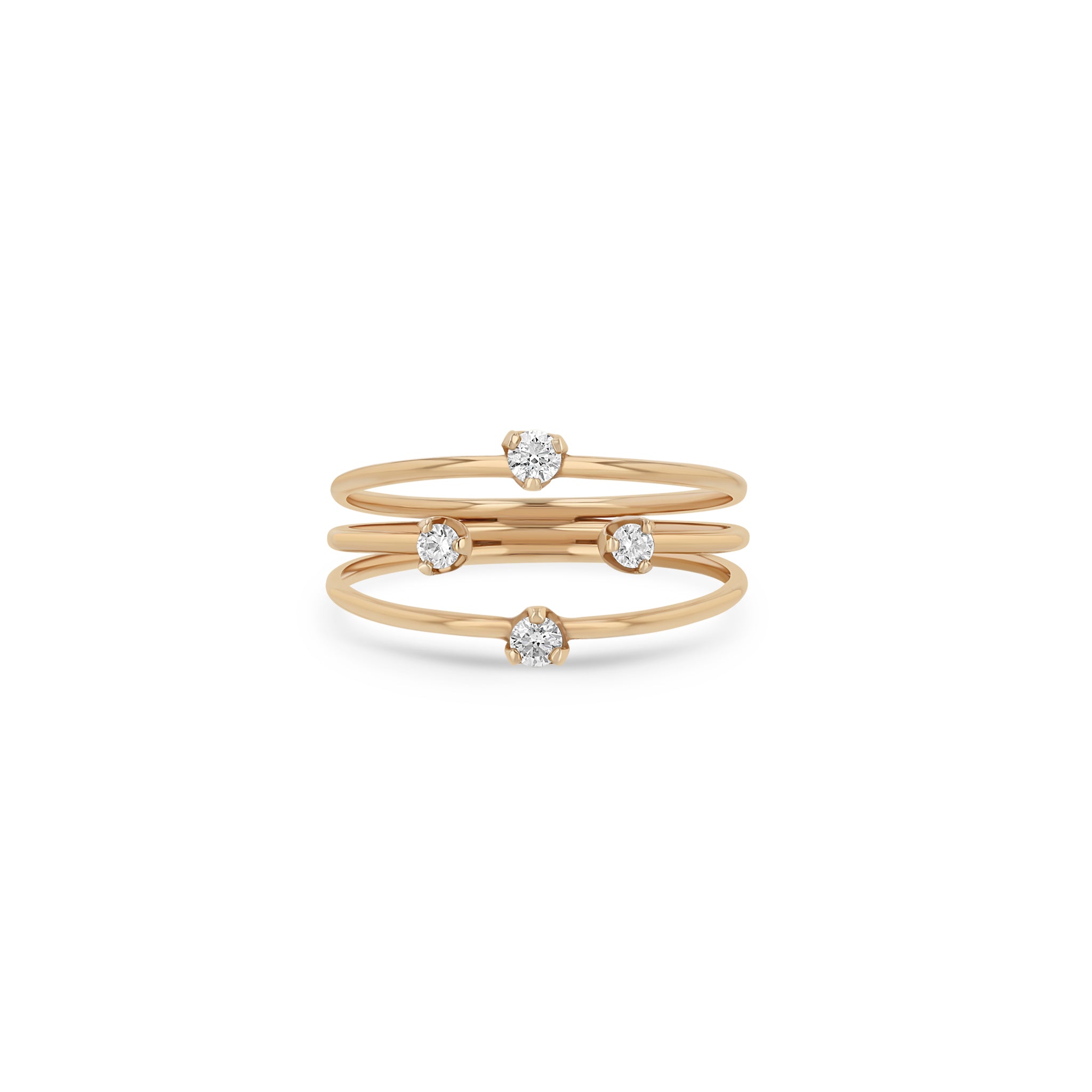 Zoe Chicco 14k rose gold triple band prong diamond ring on a white background