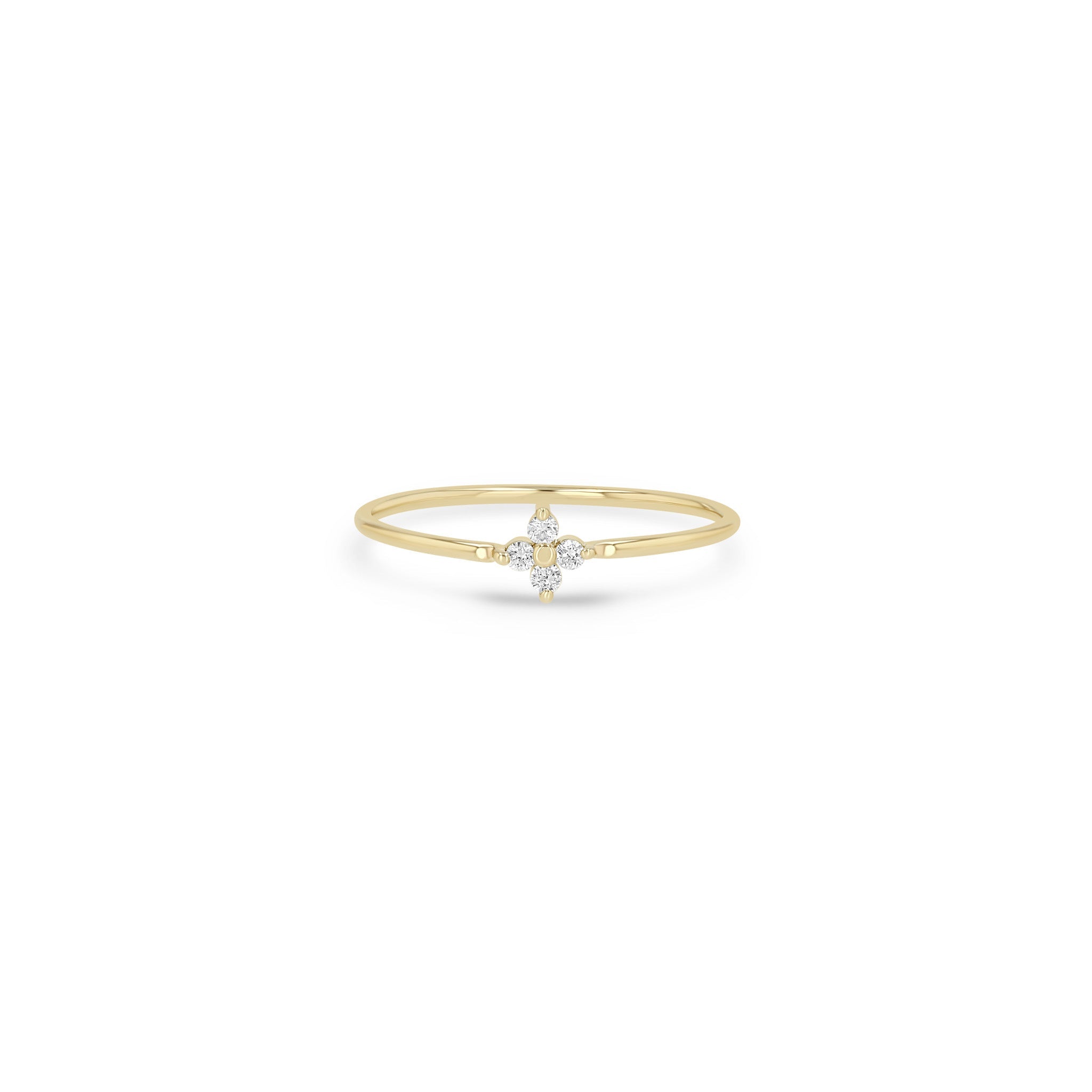 Zoe Chicco 14k gold stacking prong diamond ring on a white background