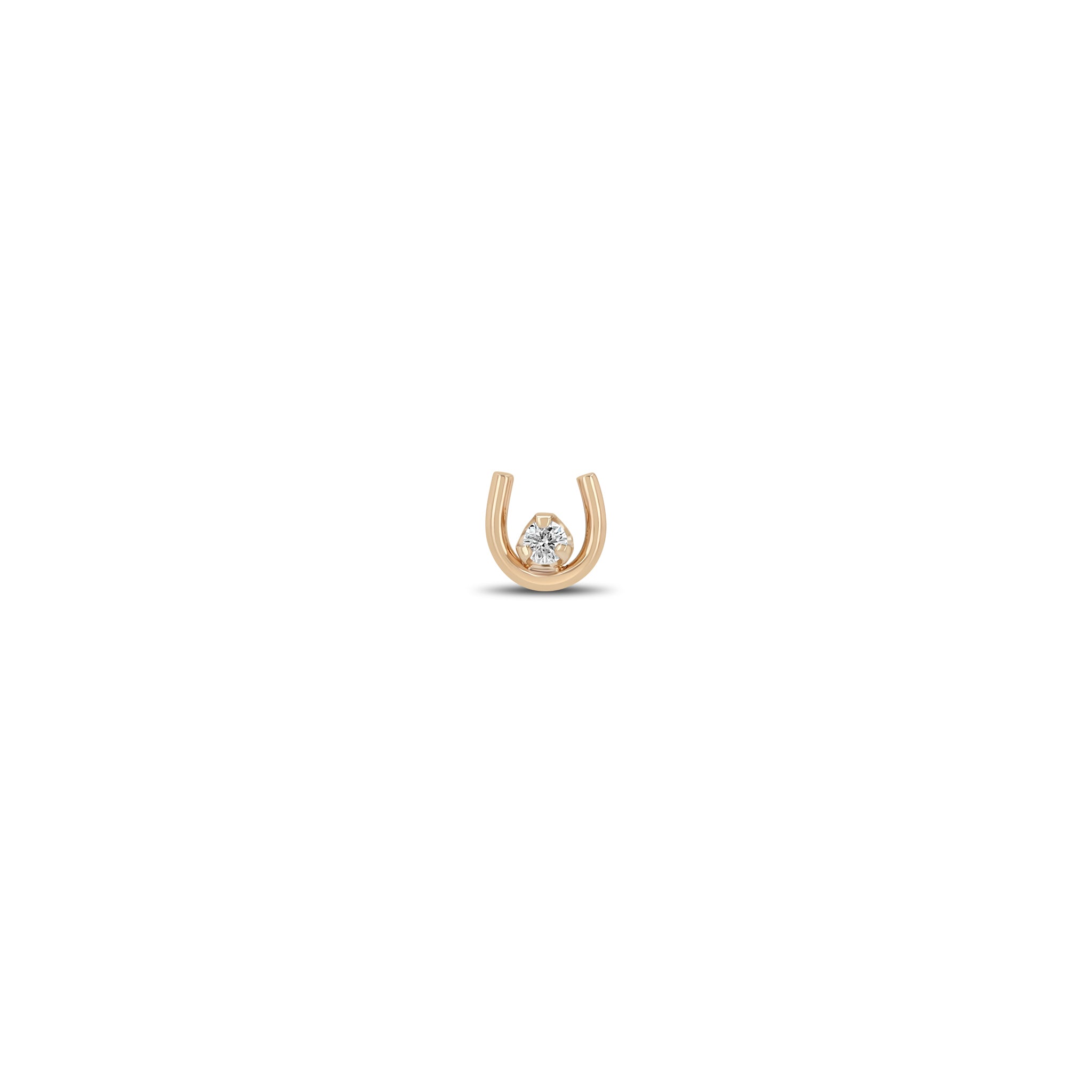 Zoe Chicco 14k rose gold small horseshoe stud earring with a single prong diamond on a white background