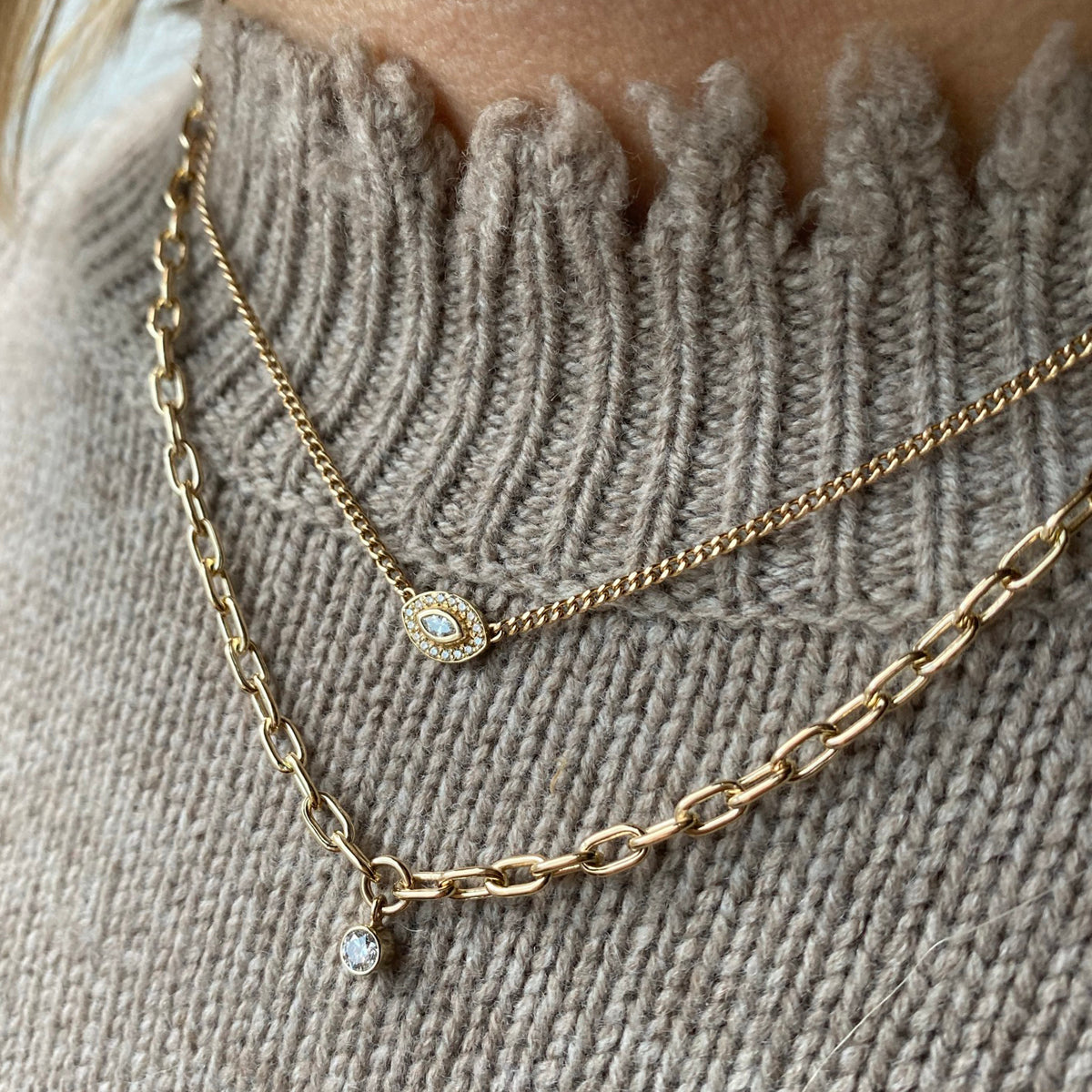 woman wearing Zoe Chicco 14k Extra Small Curb Chain Marquise Diamond Halo Necklace