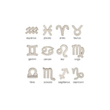 A chart of Zoë Chicco 12 zodiac symbols in 14k yellow gold