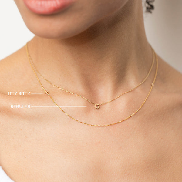 woman wearing 14k Itty Bitty Initial Letter Necklace