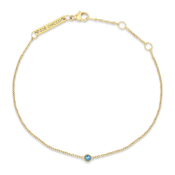 top down view of a Zoe Chicco 14k Gold Single Aquamarine Bezel Bracelet | March Birthstone