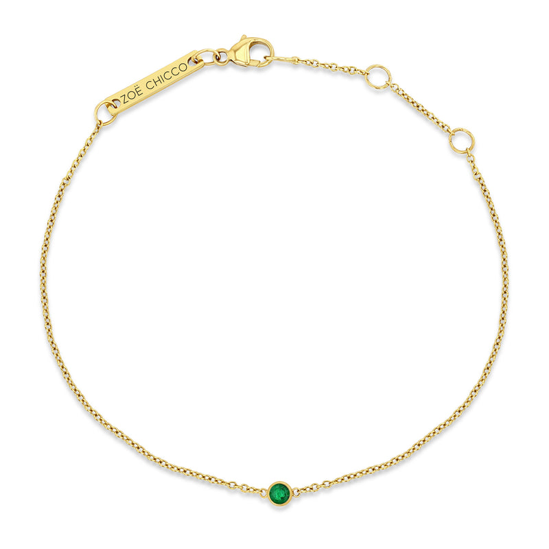 Top down view of a Zoë Chicco 14k Gold Single Emerald Bezel Chain Bracelet | May Birthstone