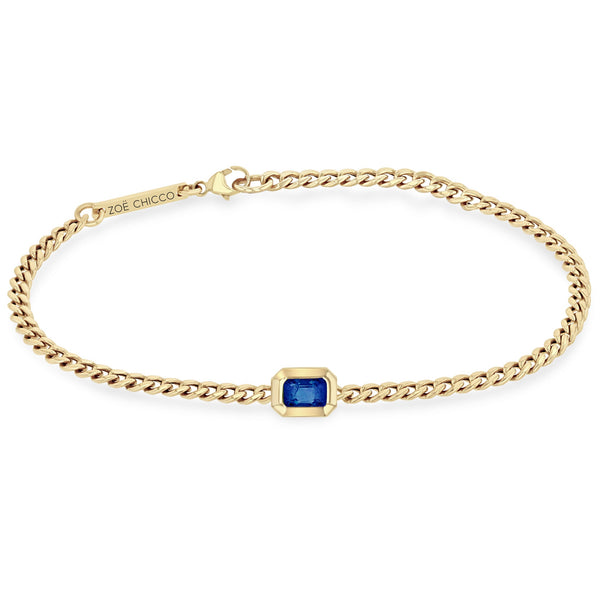 Zoe Chicco 14k gold chain bracelet with a rectangular-shaped blue sapphire on a white background