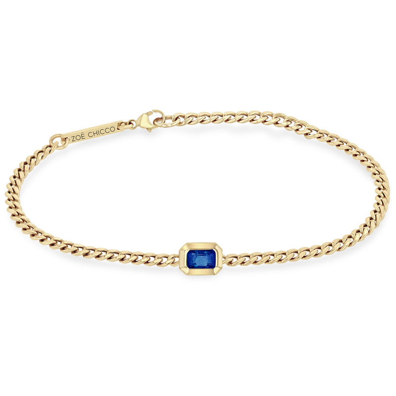 Zoe Chicco 14k gold chain bracelet with a rectangular-shaped blue sapphire on a white background