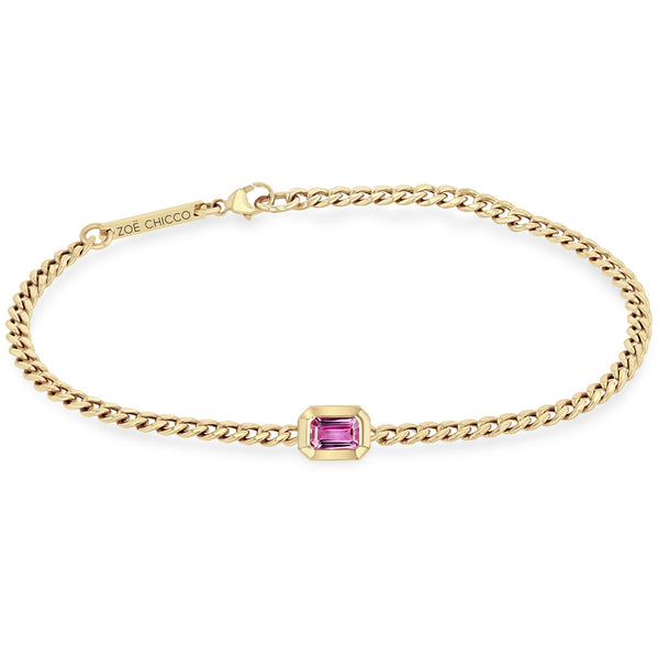 Zoe Chicco 14k gold chain bracelet with a rectangular shaped pink sapphire on a white background