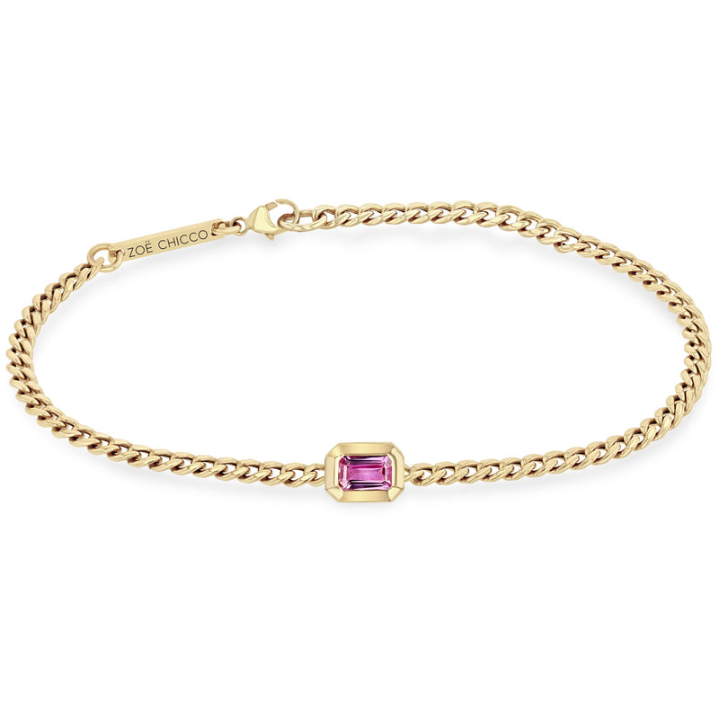 Zoe Chicco 14k gold chain bracelet with a rectangular shaped pink sapphire on a white background