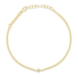 top down view of a Zoë Chicco 14k Gold Princess Diamond XS Curb Chain Bracelet