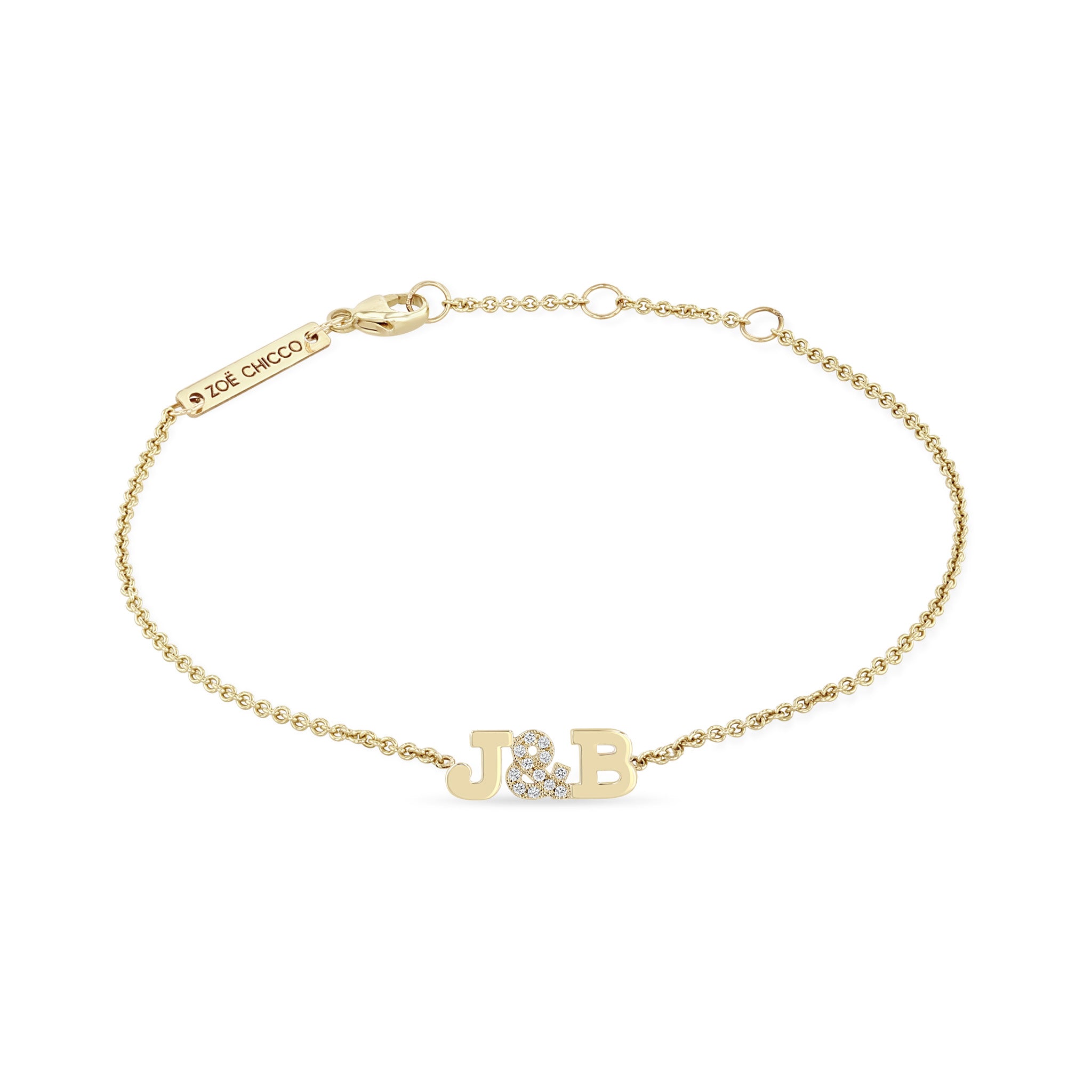 Zoe Chicco 14k gold chain bracelet with initials "J B" and a pave diamond ampersand on a white background