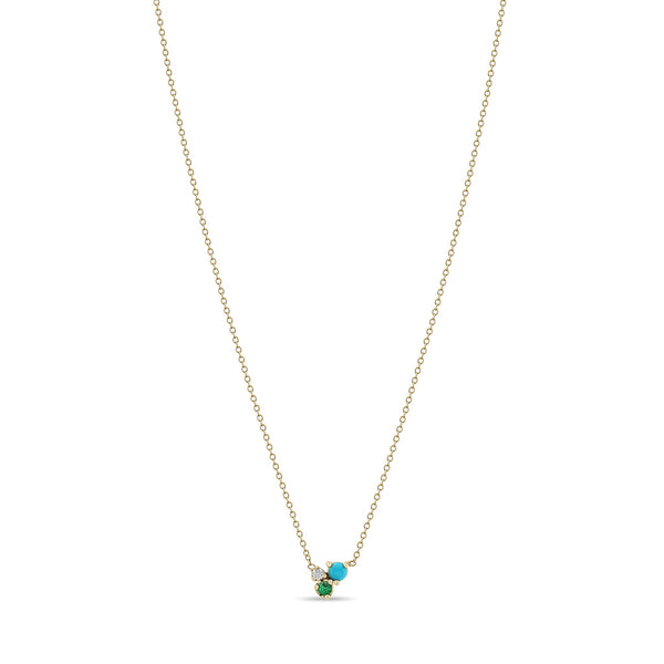 Zoe Chicco 14k gold chain necklace with a diamond, emerald, and turquoise small pendant on a white background
