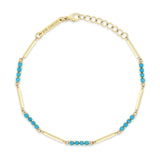 top down view of a Zoë Chicco 14k Gold Mixed Gold & Turquoise Bar Bracelet