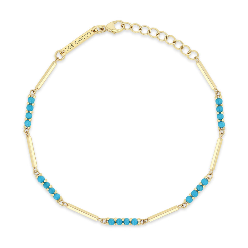 top down view of a Zoë Chicco 14k Gold Mixed Gold & Turquoise Bar Bracelet