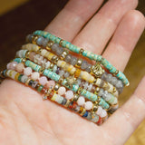 14k Gold & Light Turquoise Heishi Bead Seashell Charm Bracelet and 14k Gold & Sandy Feldspar Mixed Heishi Bead Starfish Charm Bracelet and other mixed gemstone bracelets