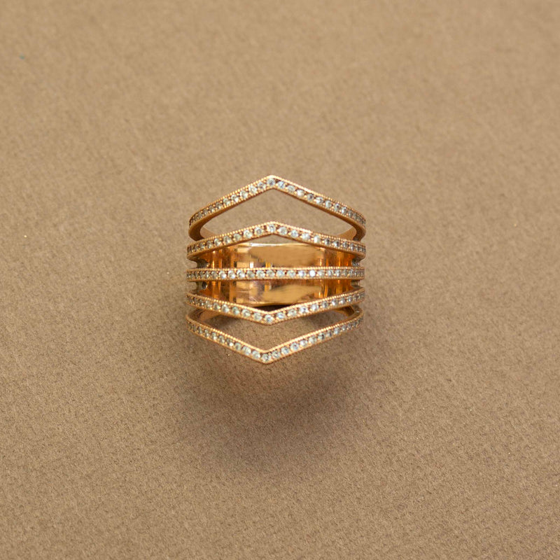 14k Pavé Diamond 5 Pointed Band Ring on a brown background