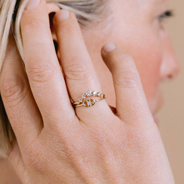 A Woman wearing Zoë Chicco 14k Gold Baguette Diamond Open Link Ring