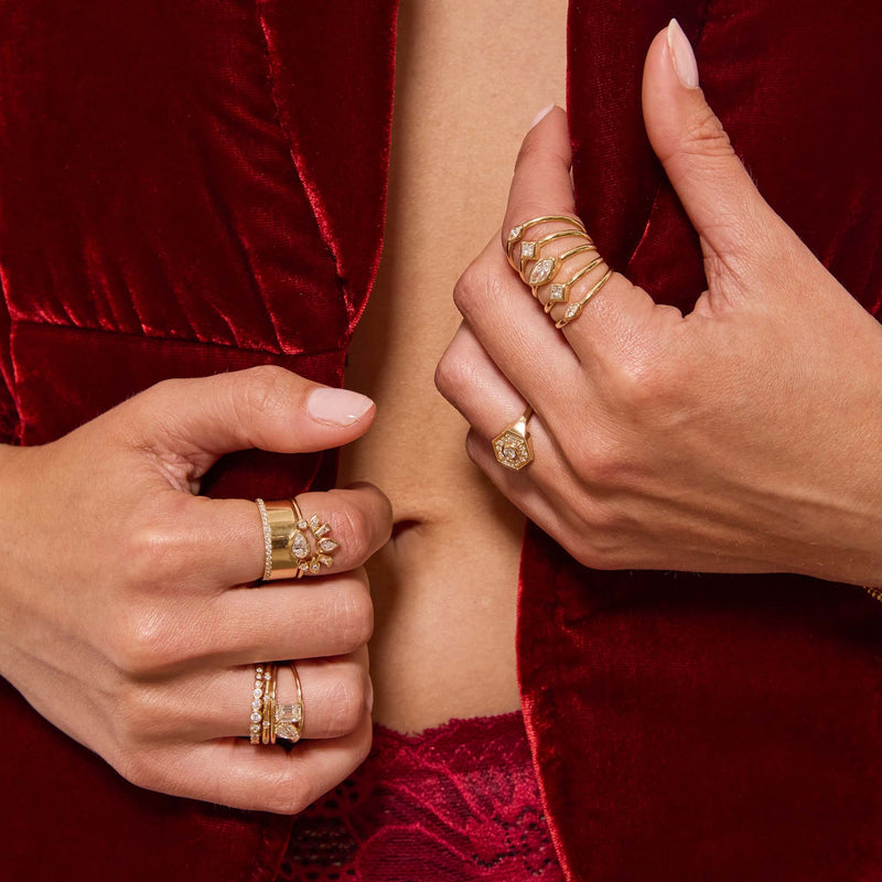 Zoe Chicco's 14k Marquise & Princess Diamonds 5 Band Ring in a layered look against a red velvet jacket.