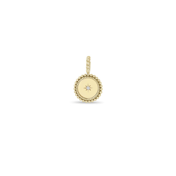 Zoe Chicco 14k gold charm pendant with a central gemstone on a white background