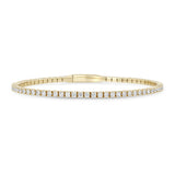 Zoe Chicco 14k gold prong diamond tennis bracelet on a white background