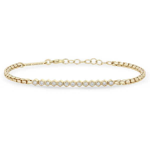 Zoe Chicco 14k gold chain bracelet with multiple hexagon set white diamonds in the center on a white background