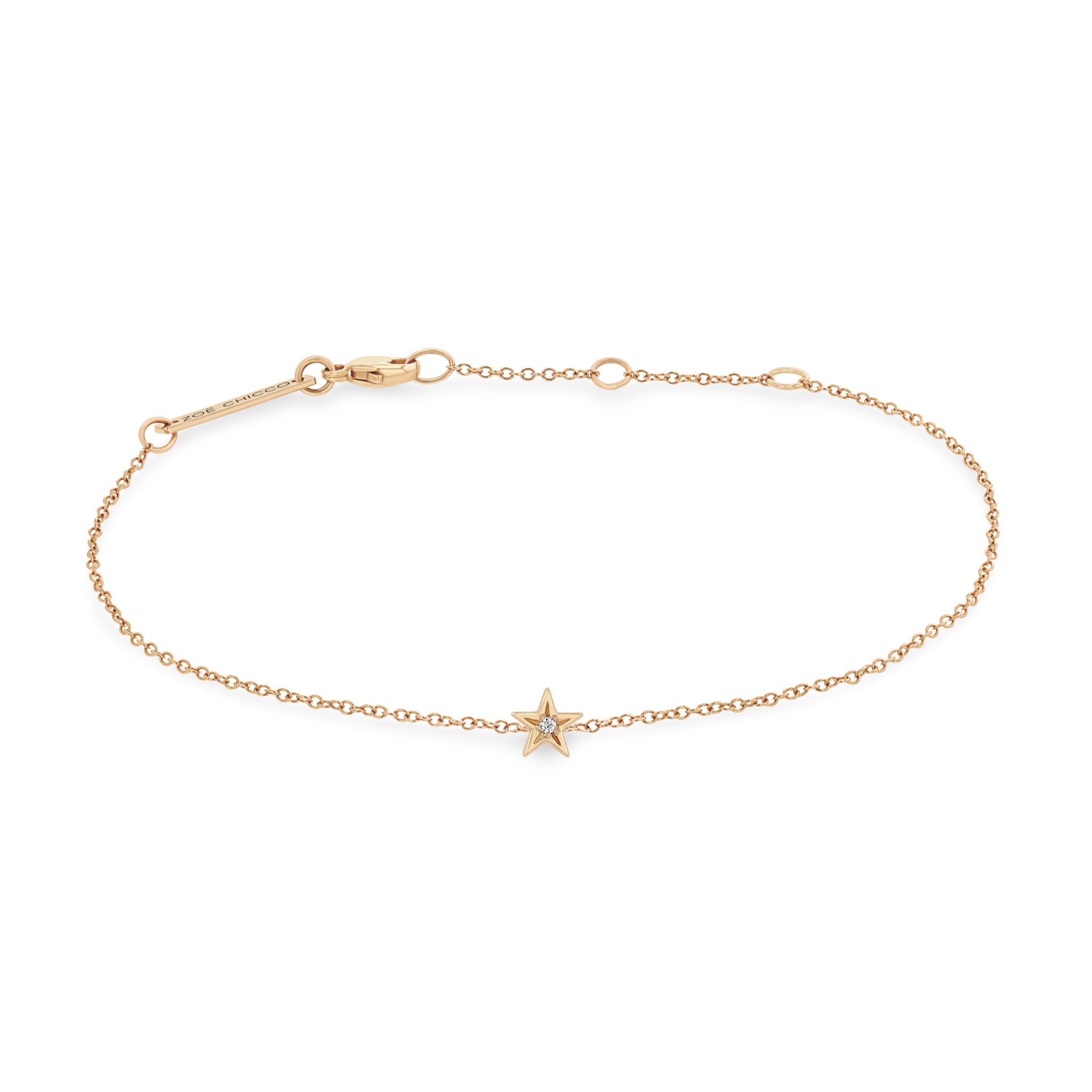 Zoe Chicco 14k rose gold bracelet with an itty bitty star charm with a single white diamond in the center on a white background