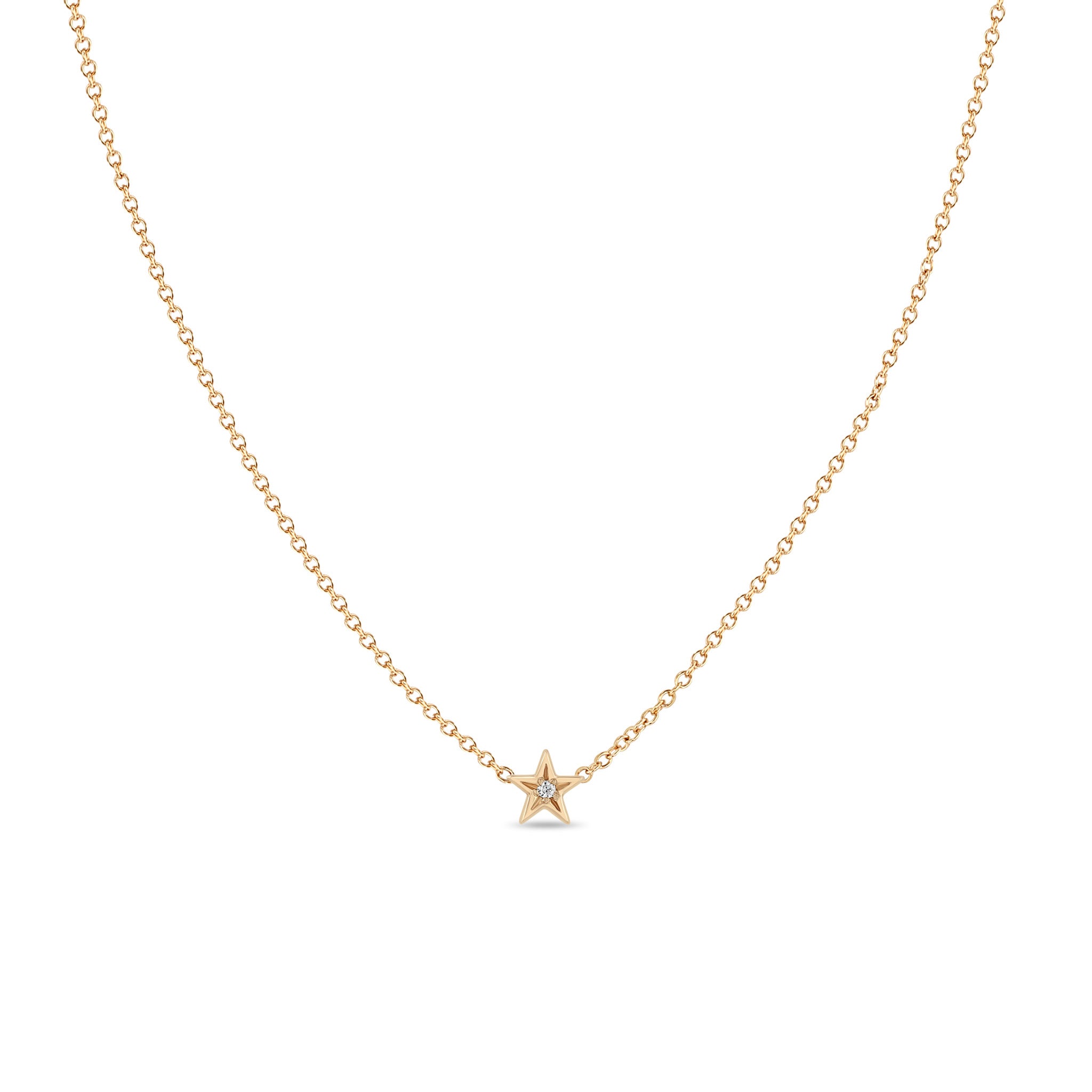 Zoe Chicco 14k rose gold itty bitty star necklace with a star set diamond in the center on a white background 