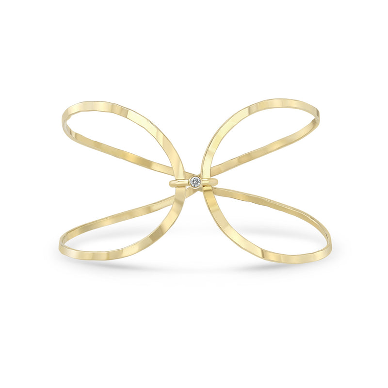 Zoe Chicco 14k gold infinity shaped wire cuff bracelet with single diamond on white background