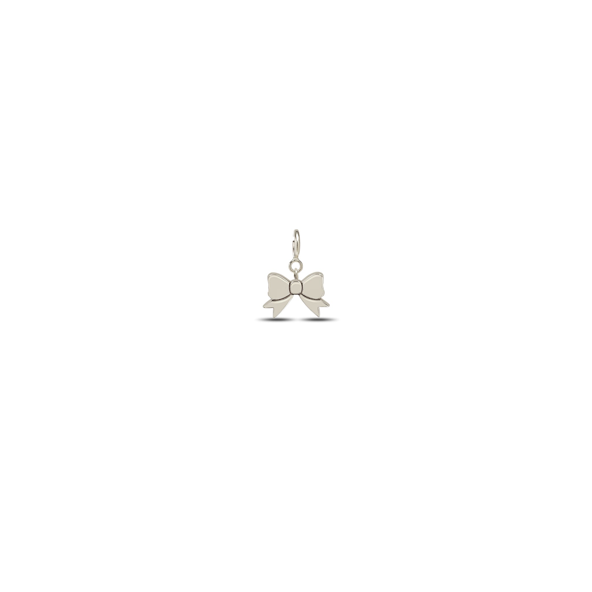 Zoe Chicco 14k white gold midi bitty bow charm on a white background