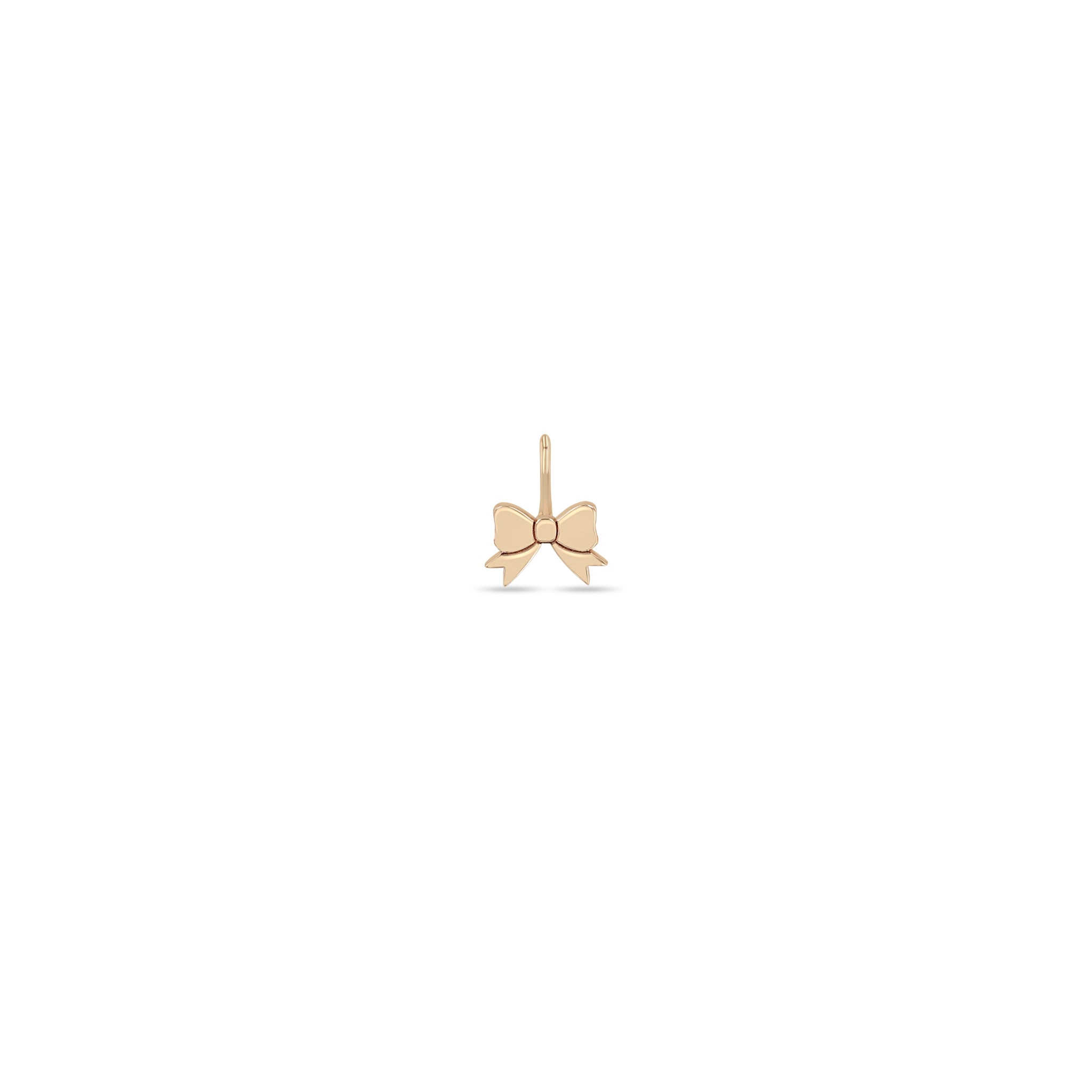Zoe Chicco 14k rose gold midi bitty bow charm on a white background