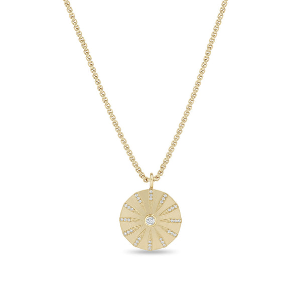Zoe Chicco 14k circular sunbeam pendant necklace with small diamonds on a white background
