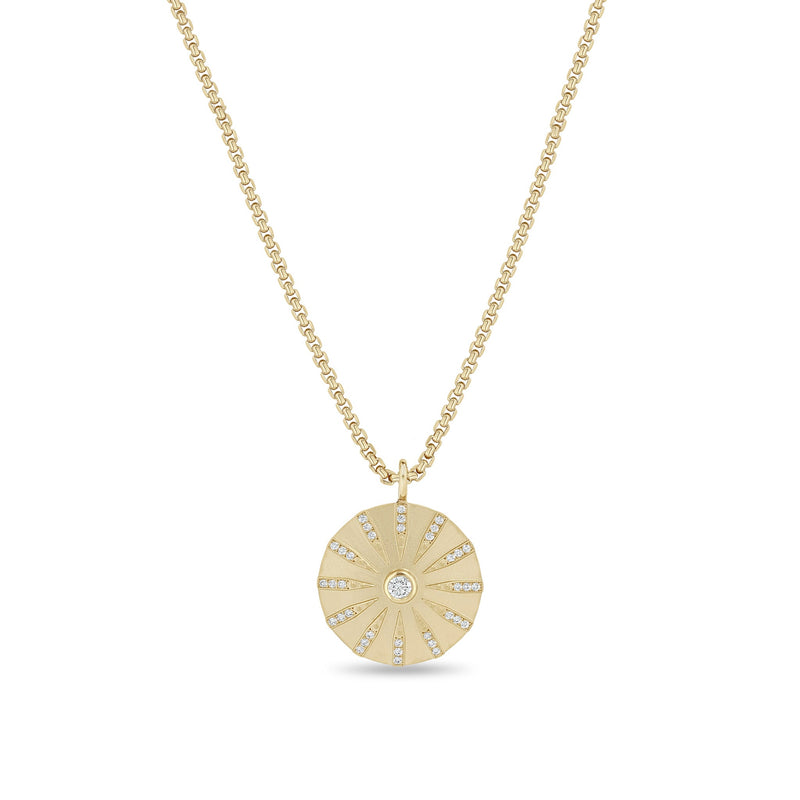 Zoe Chicco 14k circular sunbeam pendant necklace with small diamonds on a white background