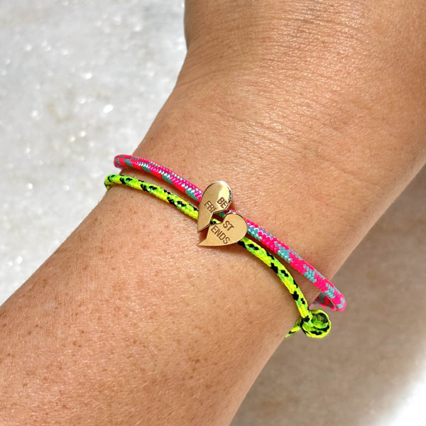 Zoë Chicco 14k Gold Midi Bitty Best Friends Heart Paracord Bracelet Set in Pink Blue and Neon Green Black stacked together on a wrist