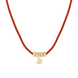 Zoe Chicco 14k gold bead and heart charm red paracord necklace on a white background