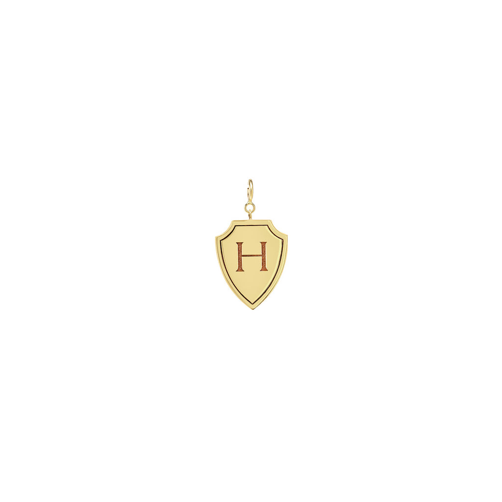 Zoe Chicco 14k gold charm shield pendant with a letter 'H' on a white background