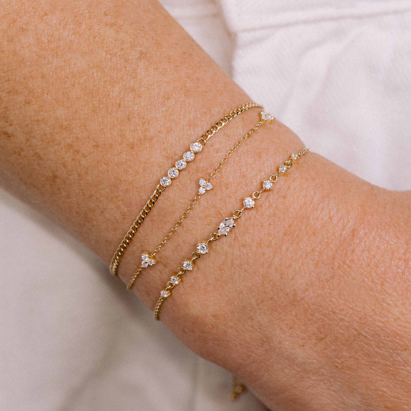 Zoe Chicco's 14k 5 Diamond Bezel Bar XS Curb Chain Bracelet and  14k 3 Diamond Trio Station Bracelet and 14k Marquise & Graduated Round Diamond Bolo Bracelet