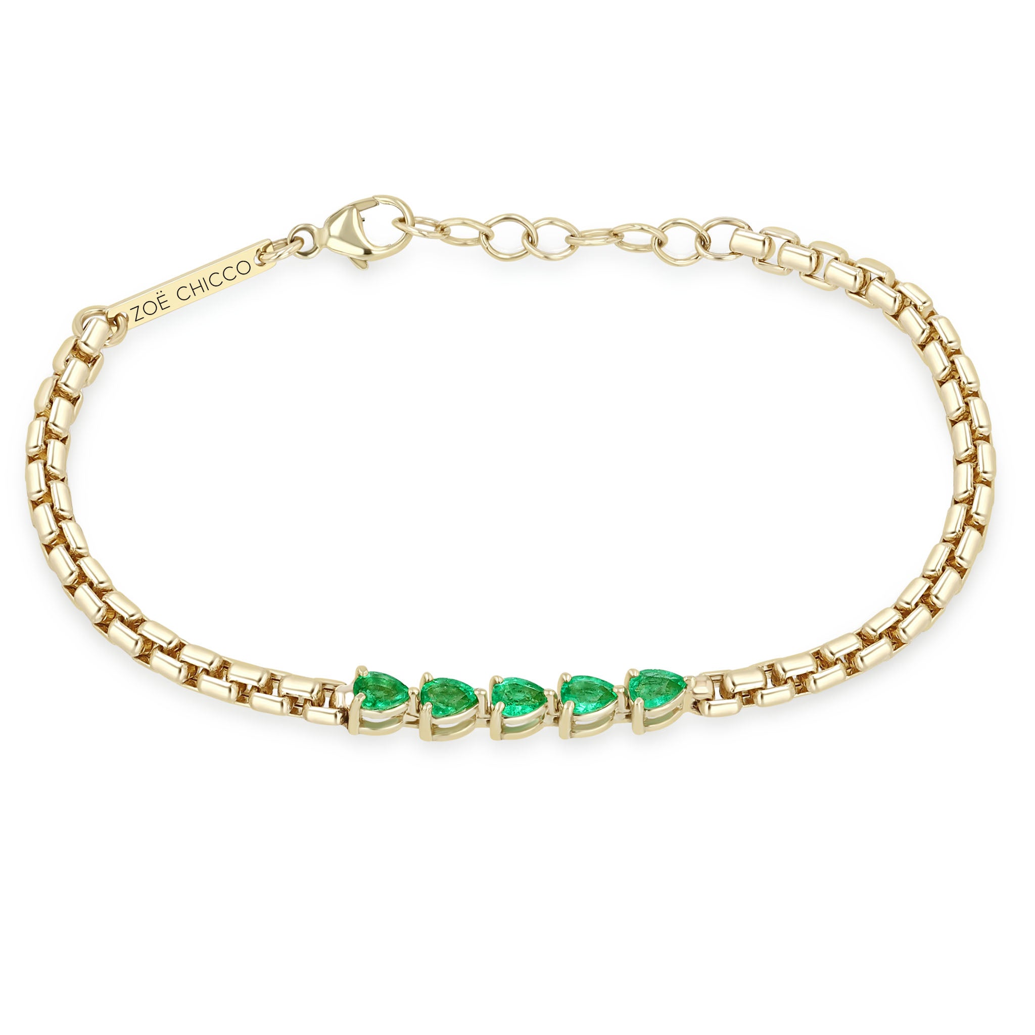 Zoe Chicco 14k gold chain bracelet with five pear-shaped emeralds linked together in the center on a white background