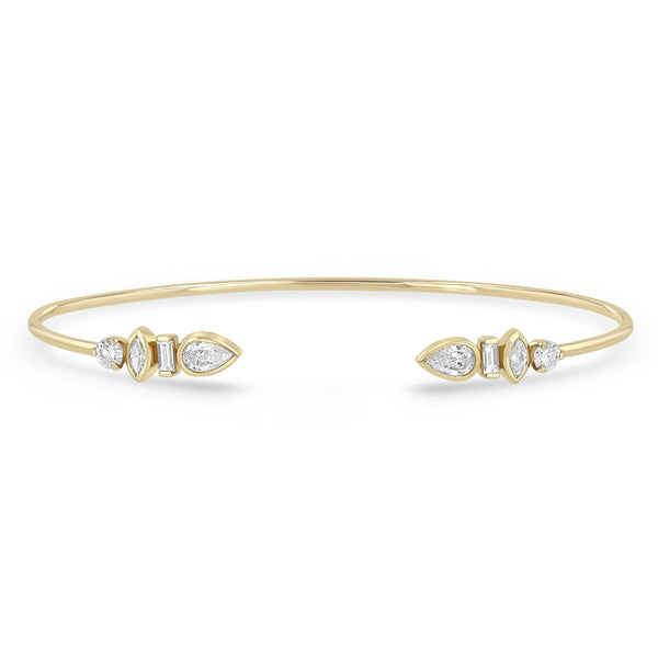 Zoe Chicco 14k gold cuff bracelet with diamond accents on a white background