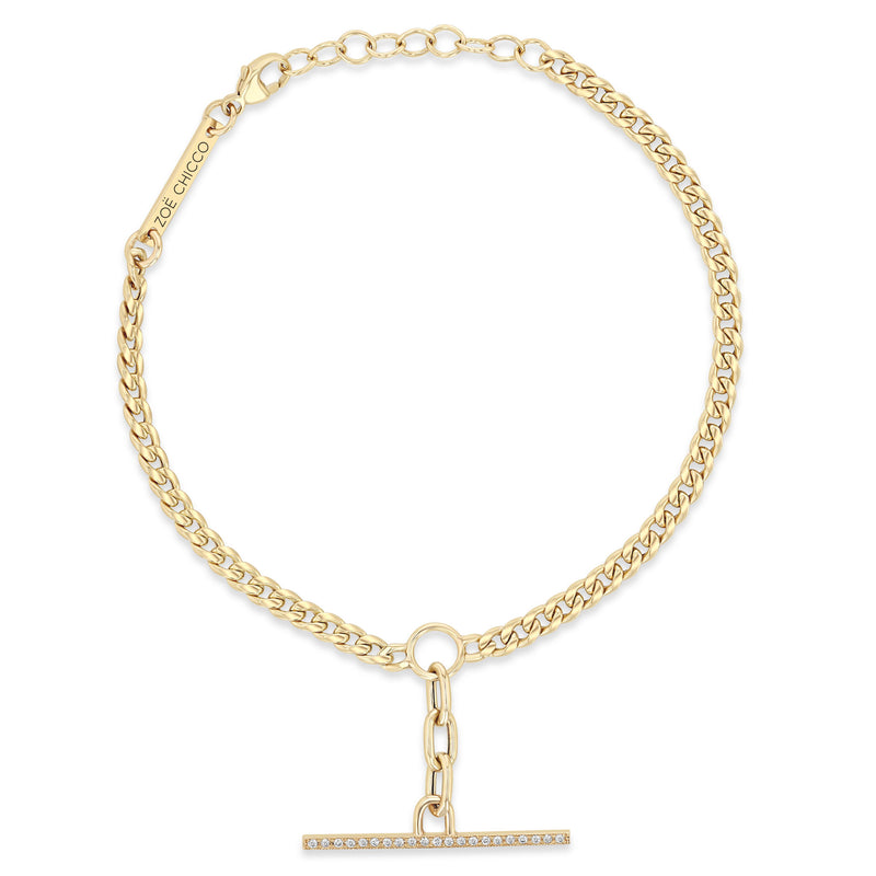 Top down view of a Zoë Chicco 14k Gold Mixed Small Curb & Medium Square Oval Chain Pavé Diamond Toggle Bracelet