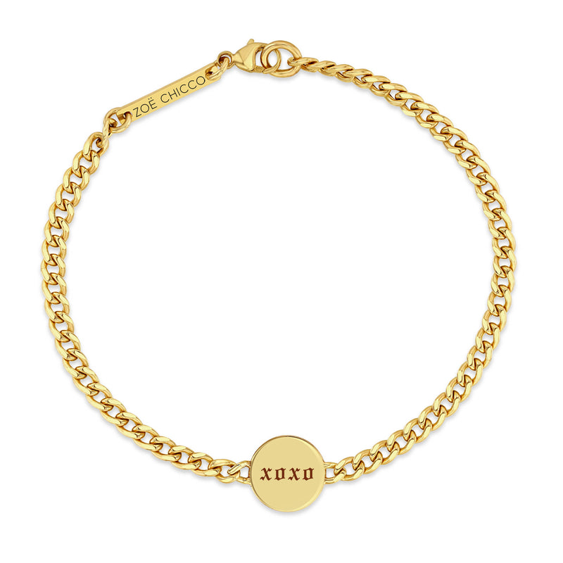 top down view of a Zoë Chicco 14k Gold love & xoxo Double-Sided Disc Curb Chain Bracelet on the xoxo side