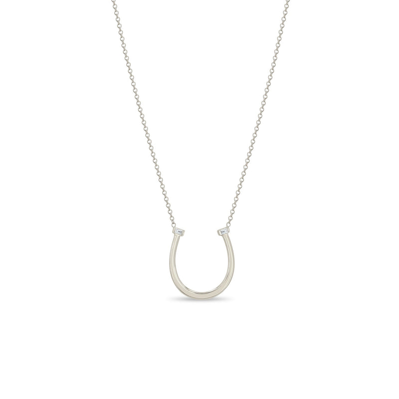 Zoe Chicco 14k white gold chain necklace with a thin horseshoe shaped pendant with two small baguette diamonds on a white background 