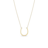 Zoe Chicco 14k gold chain necklace with thin horseshoe shaped pendant with two small baguette diamonds on a white background
