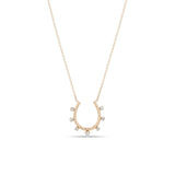 Zoe Chicco 14k rose gold horseshoe pendant necklace with small prong diamonds on a white background