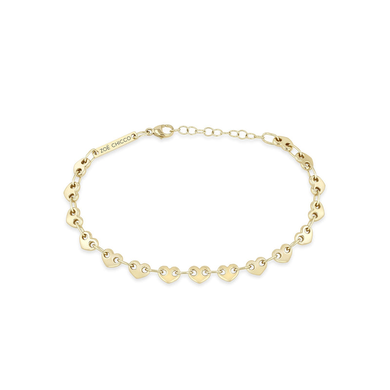 Zoe Chicco 14k gold heart shaped link chain bracelet on a white background