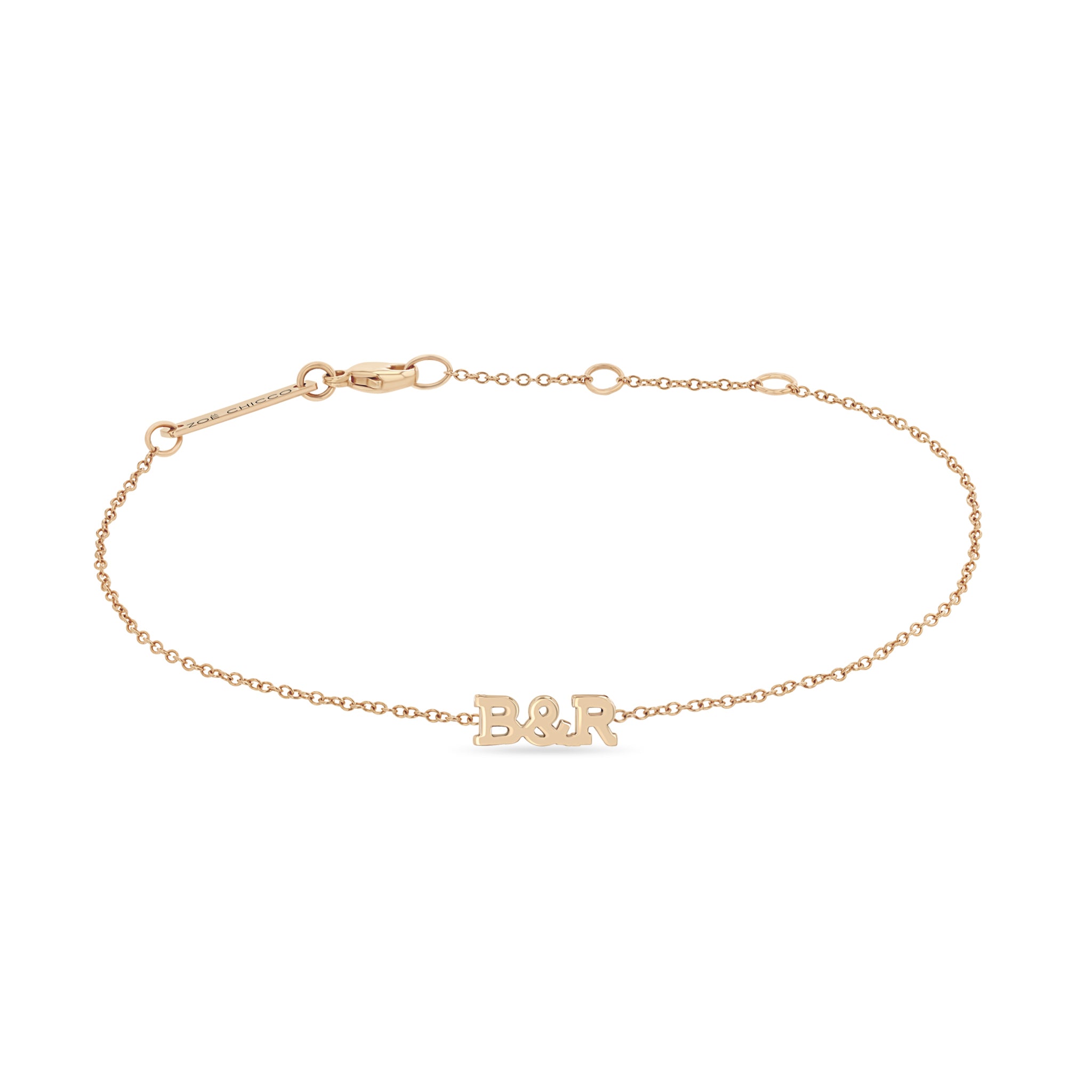 Zoe Chicco 14k rose gold itty bitty initial bracelet showing 'B & R' on a white background